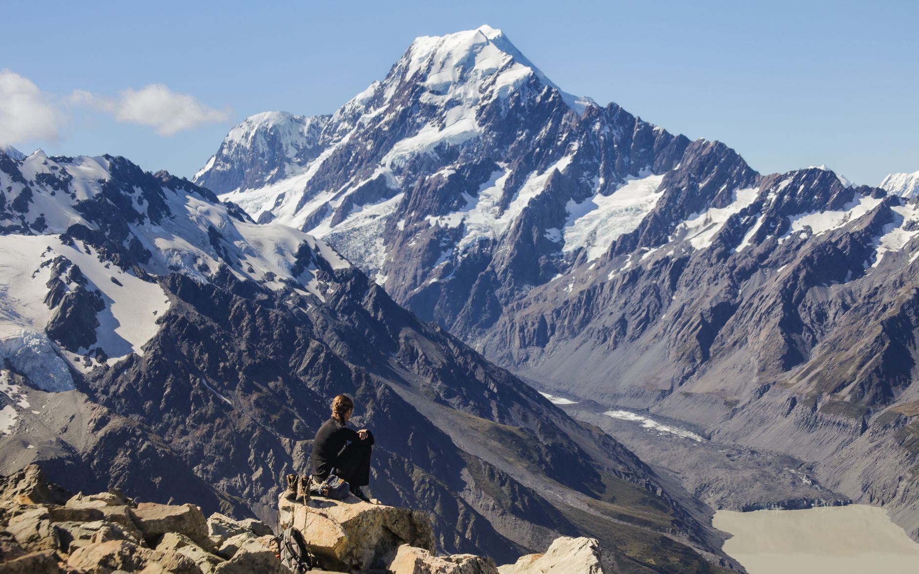 Hiker looking out over New Zealand mountain valley
